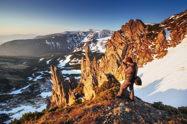 Colorful spring sunset over the mountain ranges in the national park Carpathians. Ukraine, Europe