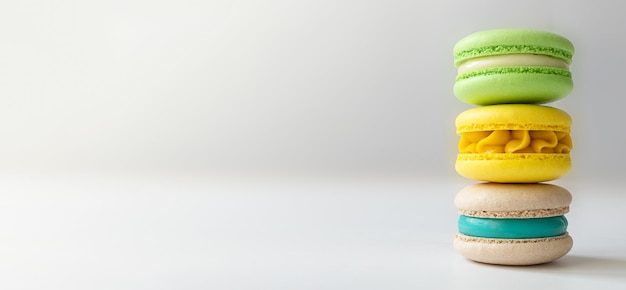 Colorful stack of macarons with copy space banner