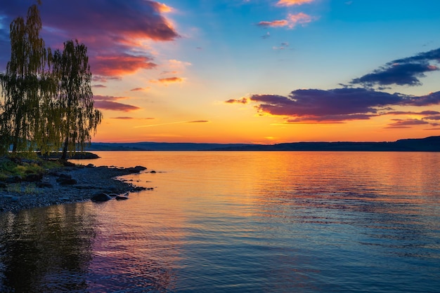 Colorful sunset over Mjosa Lake in Norway