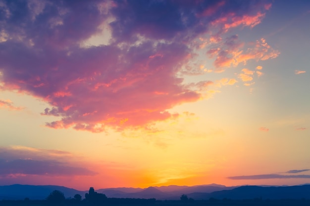 Colorful sunset sky with bright clouds