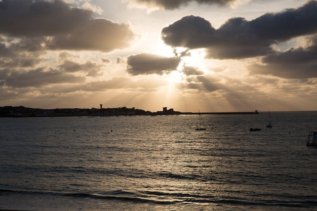 Colorful sunset with clouds in the evening grey color