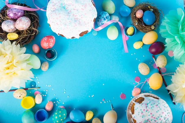 Colorful surface with Easter eggs on blue surface