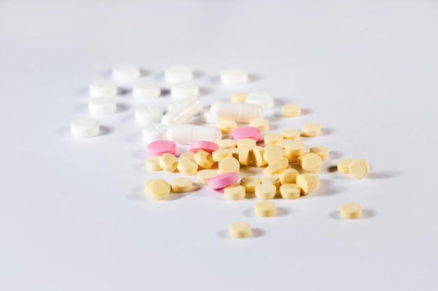 Colorful tablets with capsules healthcare abstract background