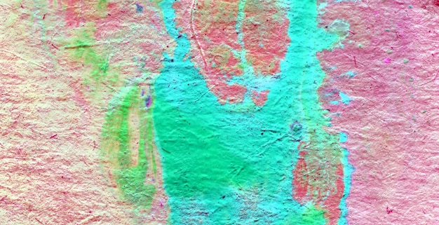 A colorful textured wall with a blue and green pattern.