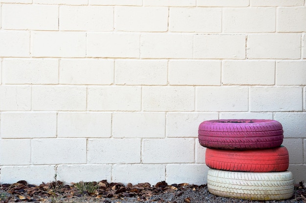 colorful tires stacked with space for text