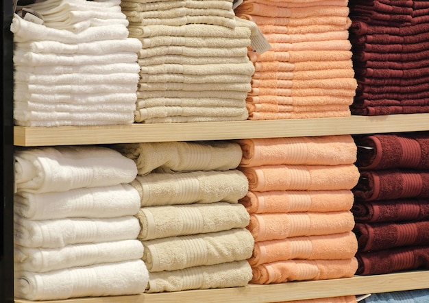 Colorful towels are placed on shelves in department stores clothing and home appliances departments