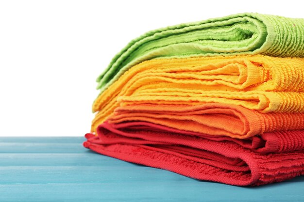 Colorful towels on light background