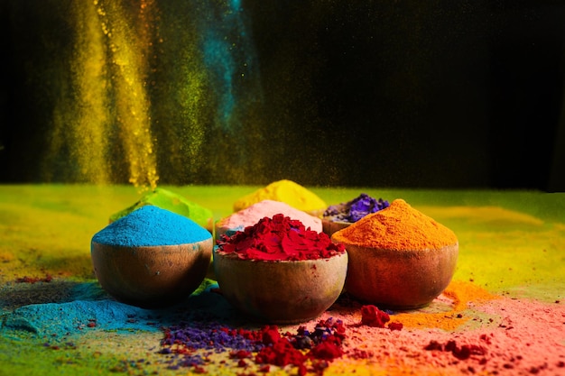 Colorful traditional Holi powder in bowls Happy Holi Concept Indian color festival