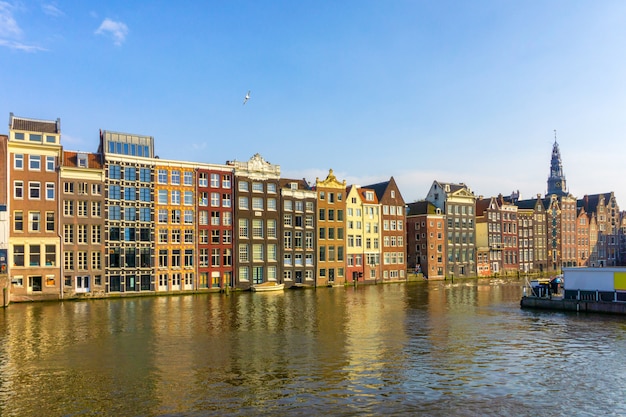 Colorful traditional old buildings in sunshine day at Amsterdam, Netherlands