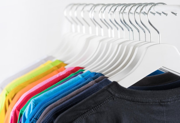 Colorful tshirts hanging on a rack