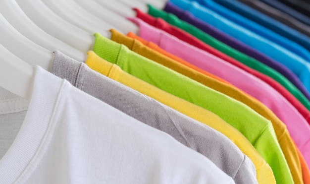 Colorful tshirts hanging on a rack