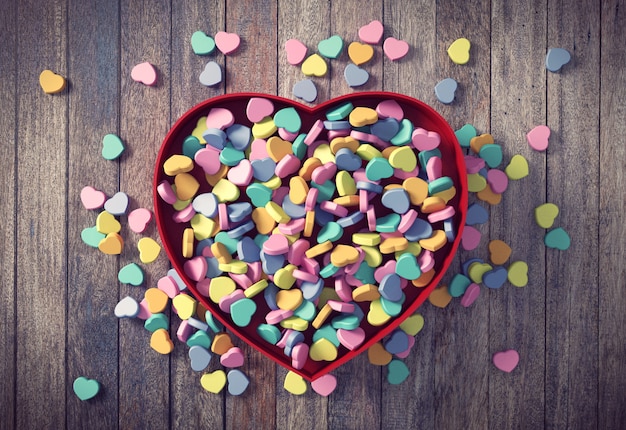 Colorful Valentines mini hearts in red heart box 