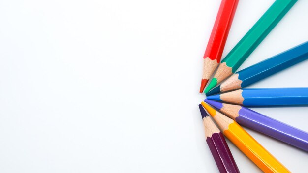 Colorful wooden pencils isolated on white background