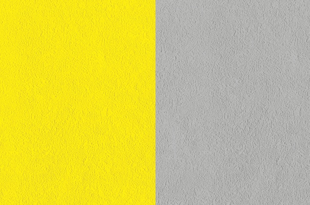 Colors of the year 2021 Illuminating yellow and ultimate gray. background, texture of fabric, decorative plaster.