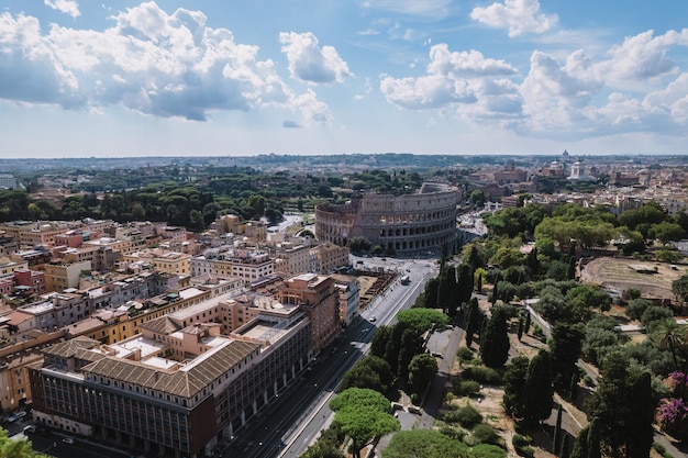 The Colosseum and the Imperial Forums in Rome beautiful aerial shot around the Colosseum