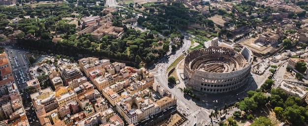 The Colosseum and the Imperial Forums in Rome beautiful aerial shot around the Colosseum