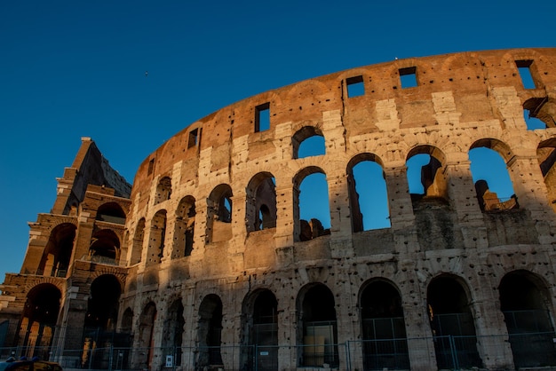 Colosseum originally known as the Flavian Amphitheater Located in the city center of Rome it is the largest Roman amphitheater in the world