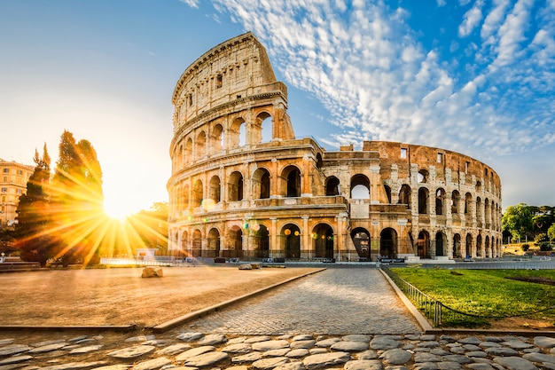 Colosseum in Rome and morning sun, Italy