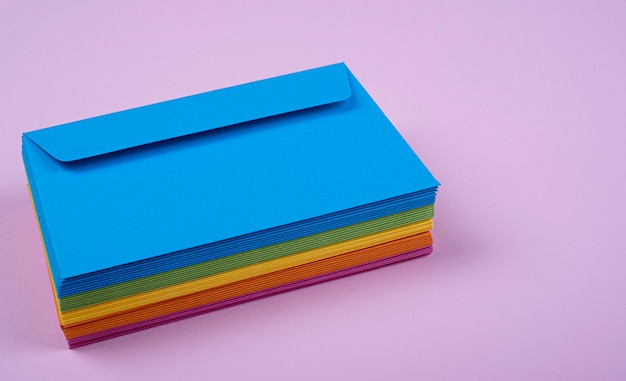 Coloured envelopes stacked