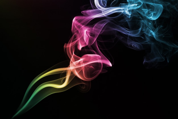 Coloured smoke isolated on black