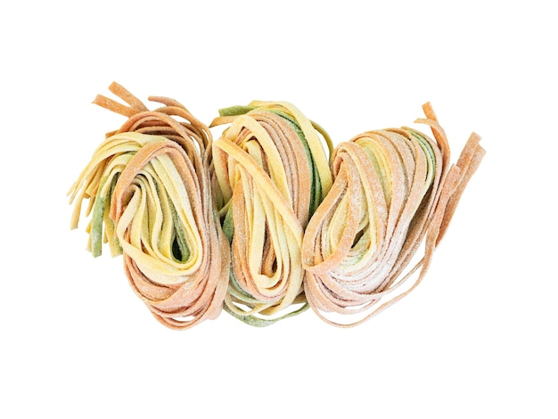 Colourful fresh pasta noodle isolated on white