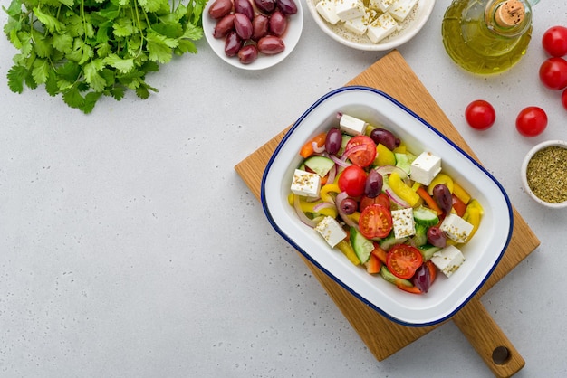 Combination of vegetables and onions tossed in olive oil dressing delicious greek salad