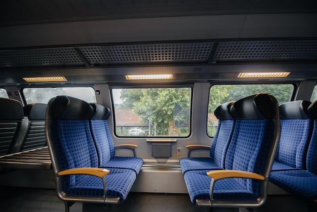 Comfortable and beautiful blue seats in the train. Transport. Travels.