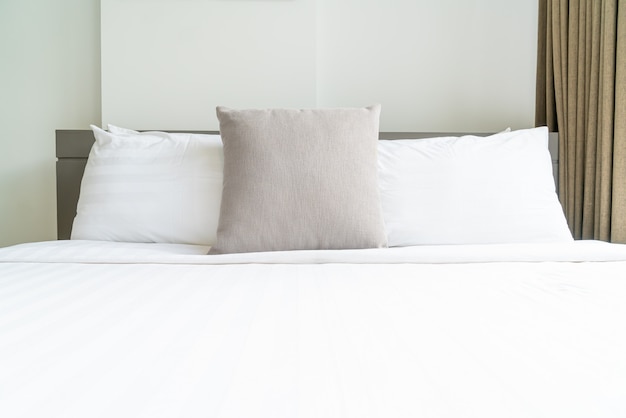 comfortable pillow decoration on bed in bedroom