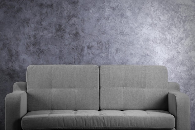 Photo comfortable sofa on grey wall background