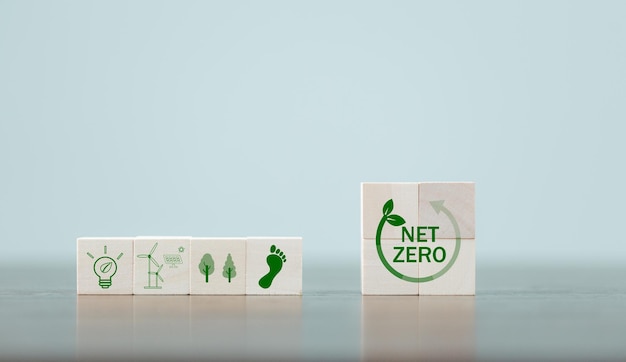 Companies are targeting net zero greenhouse gas emissions Carbon credit conceptTradable certificate to drive industry in direction of low emissions in efficiency cost Wooden cubes with decrease CO2