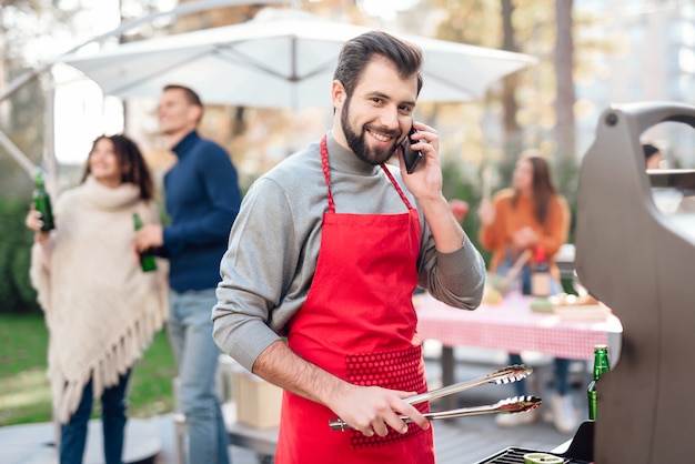 Company of people came together for a barbecue.