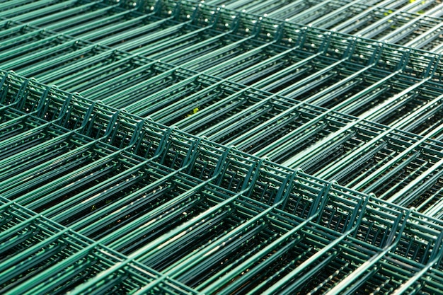 Components for the construction of a mesh fence.