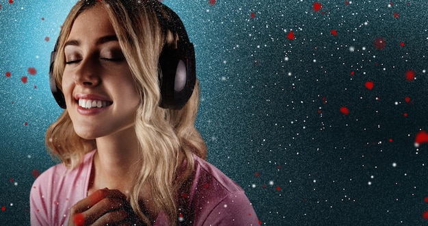 Composite image of close up of a woman listening to music