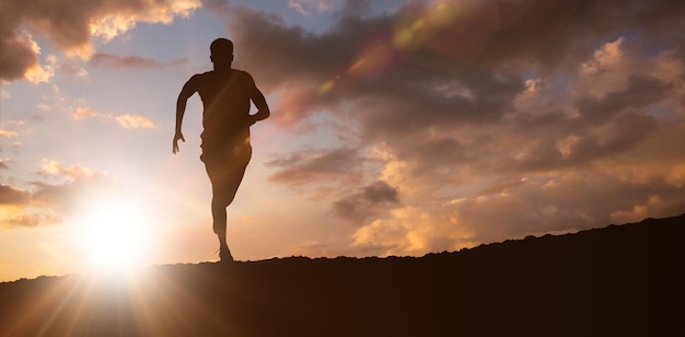 Composite image of fit man running against white background