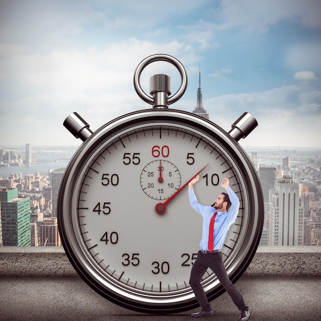 Composite image of focused bending businessman pushing while looking up