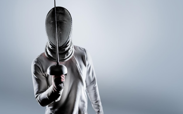 Composite image of man wearing fencing suit practicing with sword