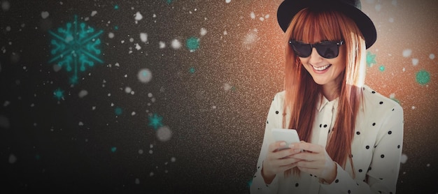 Composite image of smiling hipster woman texting with her smartphone