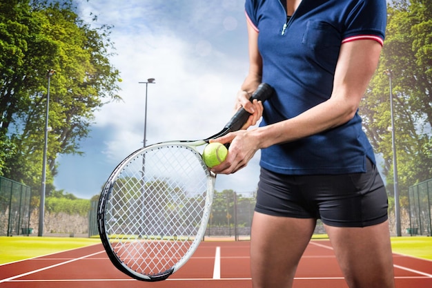 Composite image of tennis player holding a racquet ready to serve