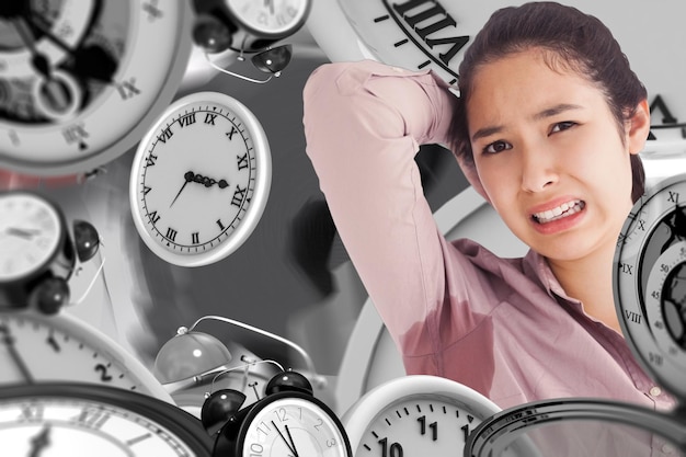 Composite image of woman appalled by her sweat patches