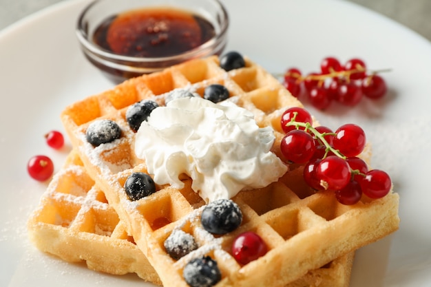 Composition of breakfast with belgian waffles