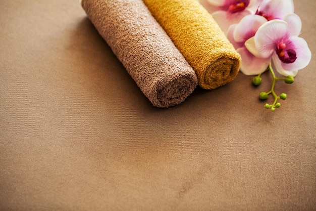 Composition brown towel in hotel room of spa treatment