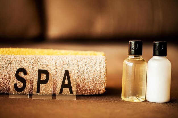 Composition brown towel in hotel room of spa treatment