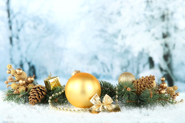 Composition of the Christmas decorations on light winter background