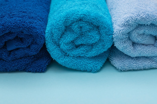 Composition of colored cotton towels the concept of softness and purity