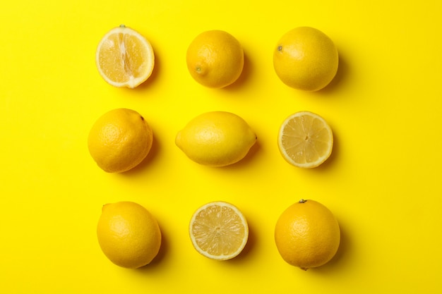 Composition composition with lemons on yellow surface