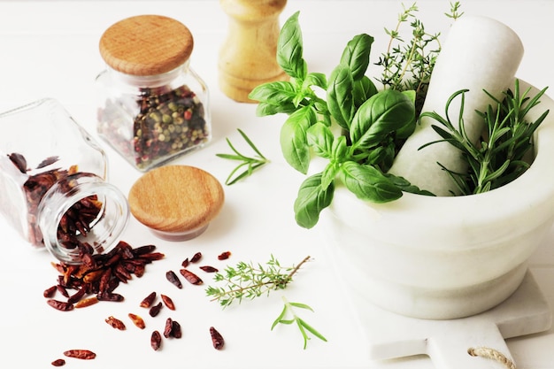 Composition of herbs and spices on the kitchen table