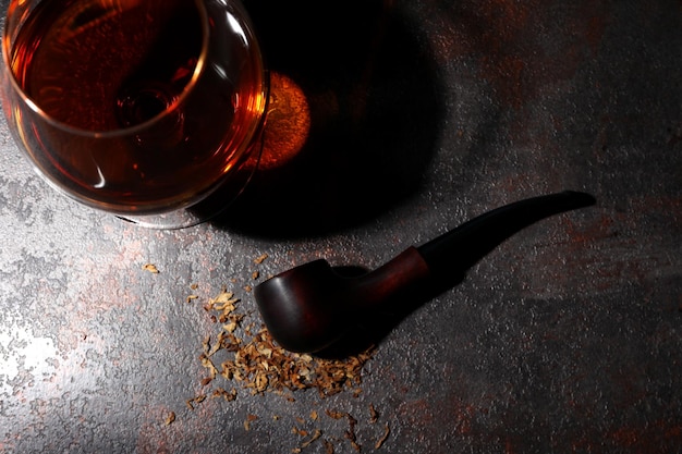 Composition of relaxation with smoking pipe and whiskey