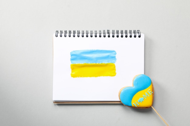 Composition for soncept Save Ukraine on light gray background top view