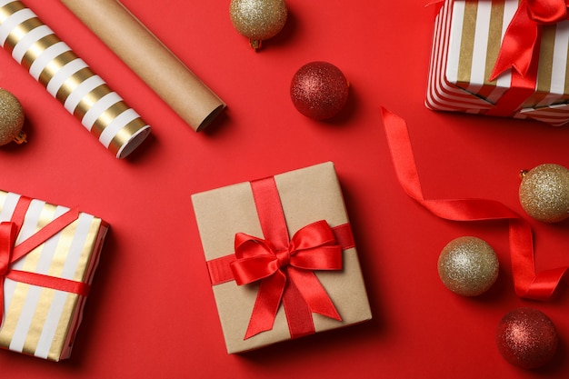 Composition with christmas accessories on red table