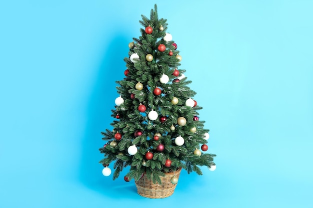 Composition with Christmas tree on blue background